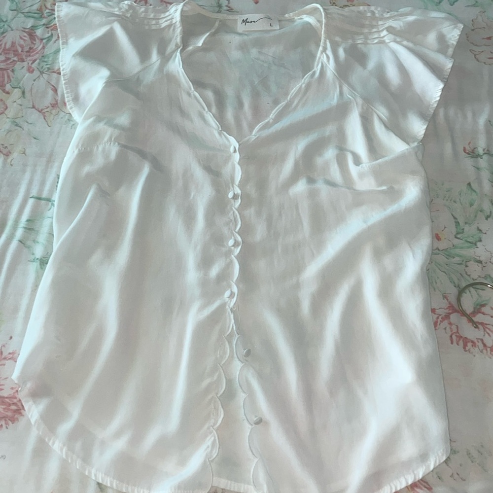 White flutter-sleeve blouse